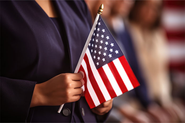 woman holding American flag