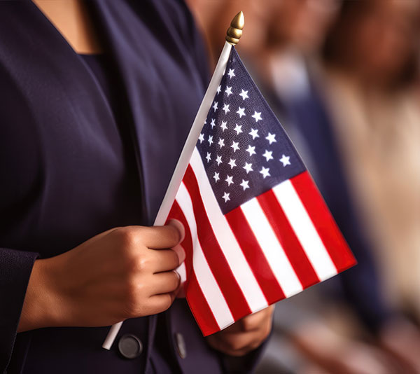 woman holding american flag